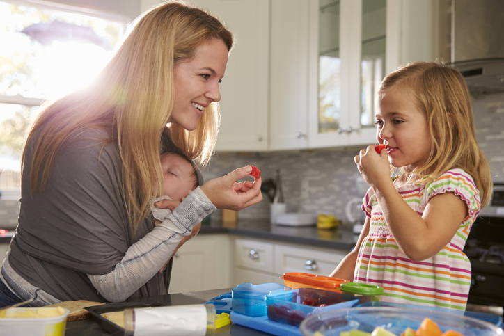 Mother and children in the kitchen.